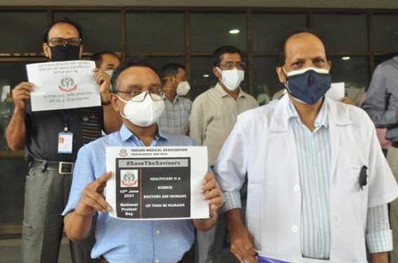 â€˜Save the saviorsâ€™: Doctors protested violence against health workers with black masks, posters